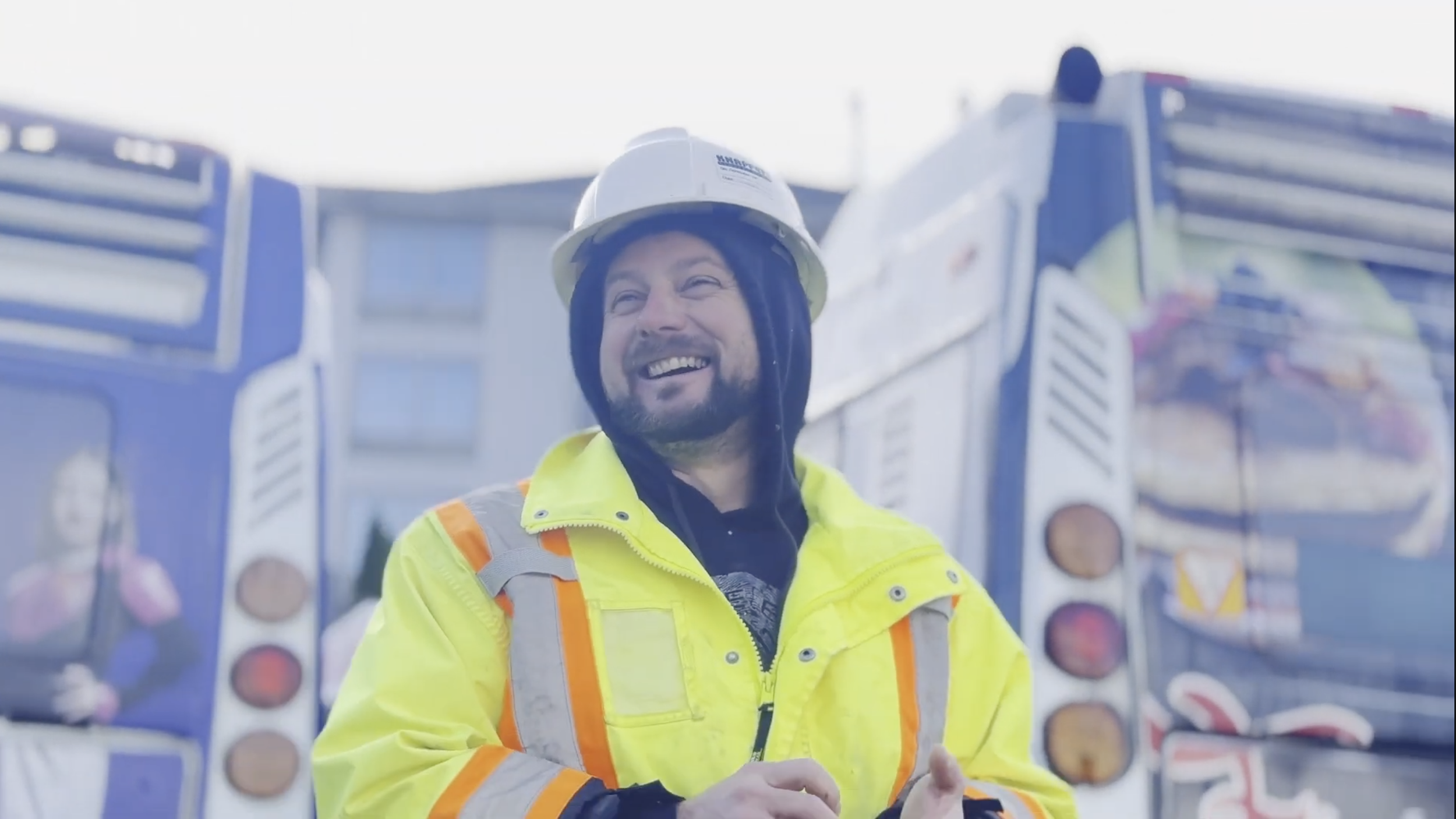 Blue Anvil tradesperson smiling on the jobsite