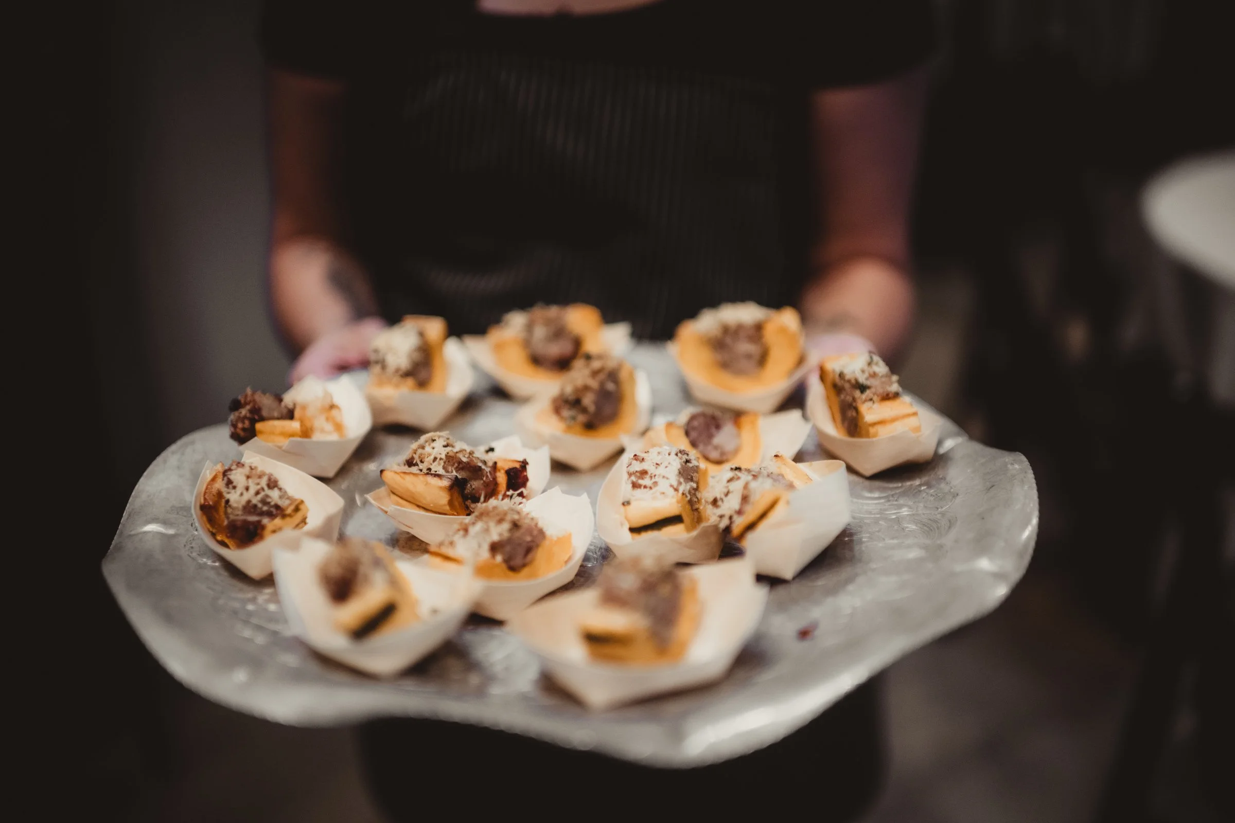 Passed savory bites presented as part of the evening's service