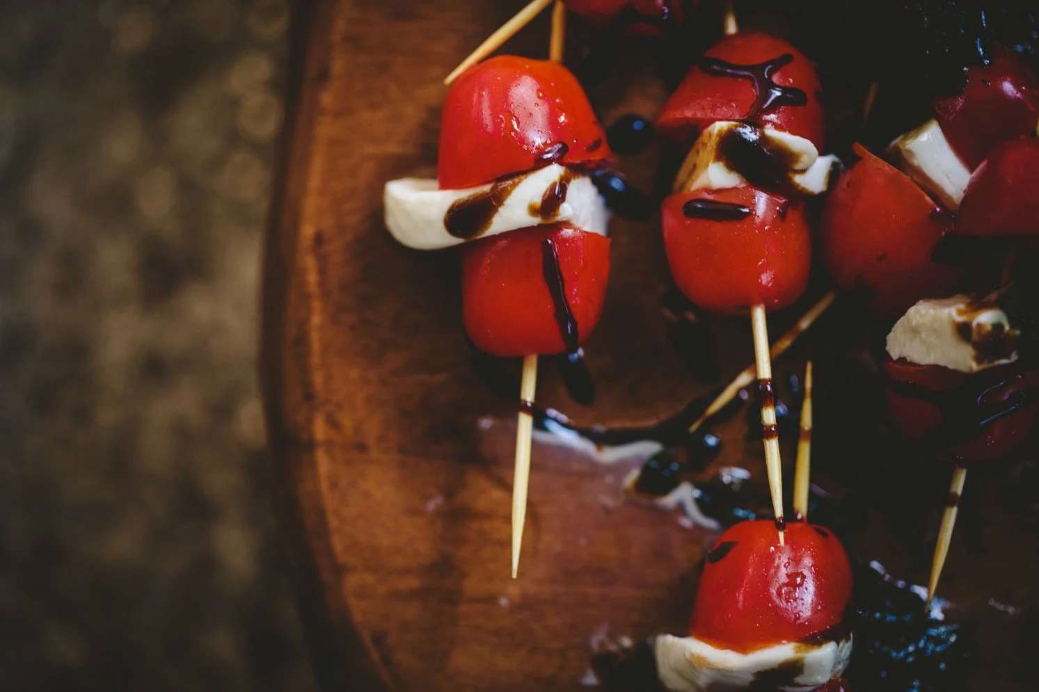Tomato and mozzarella bites arranged for service