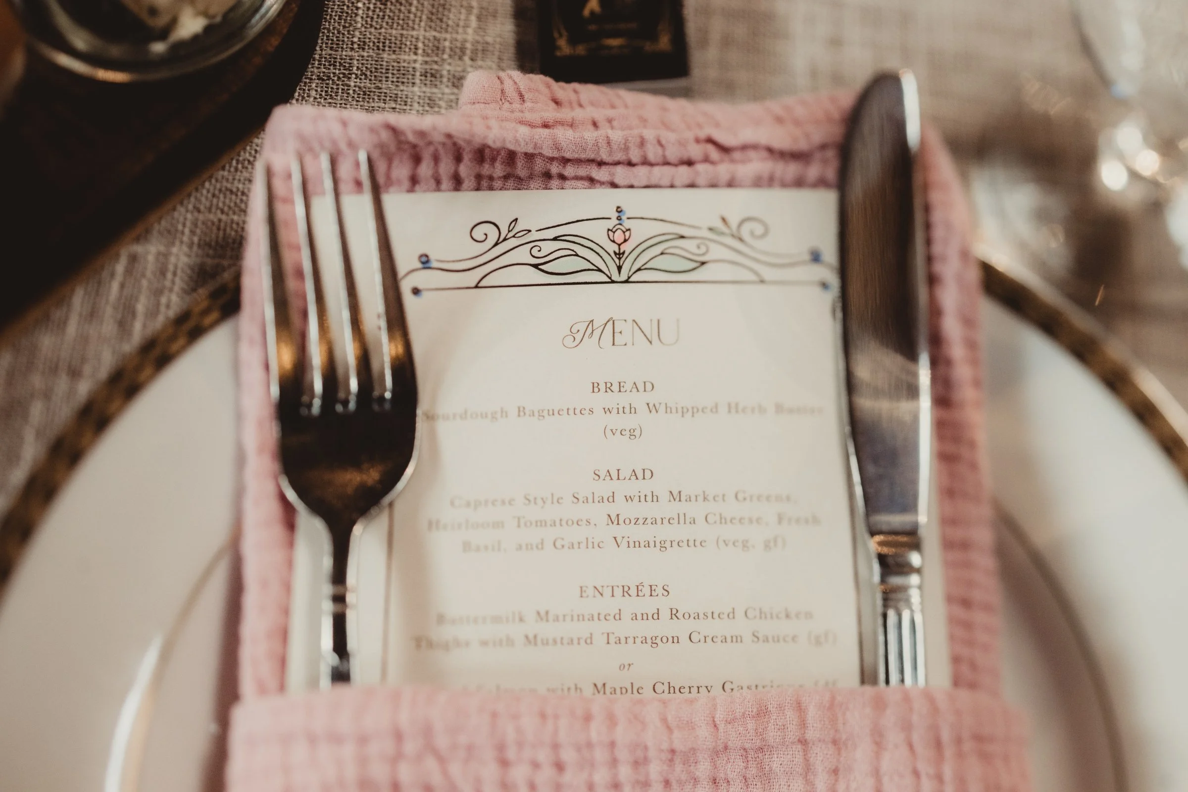 A custom Twisted Radish wedding menu placed at the table