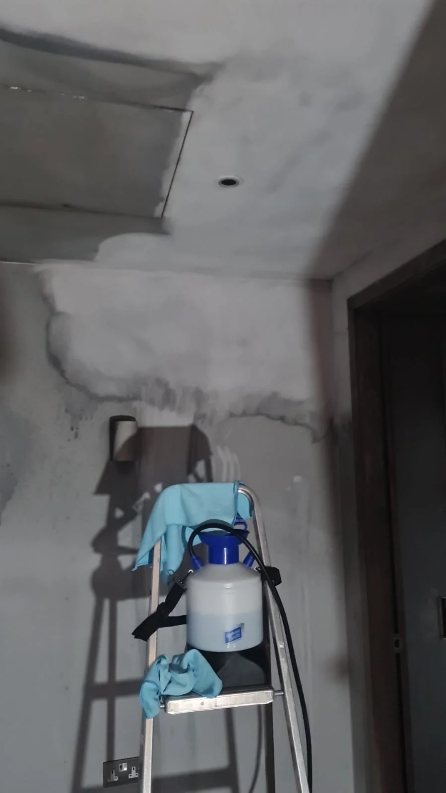 Soot damage cleaning on a wall