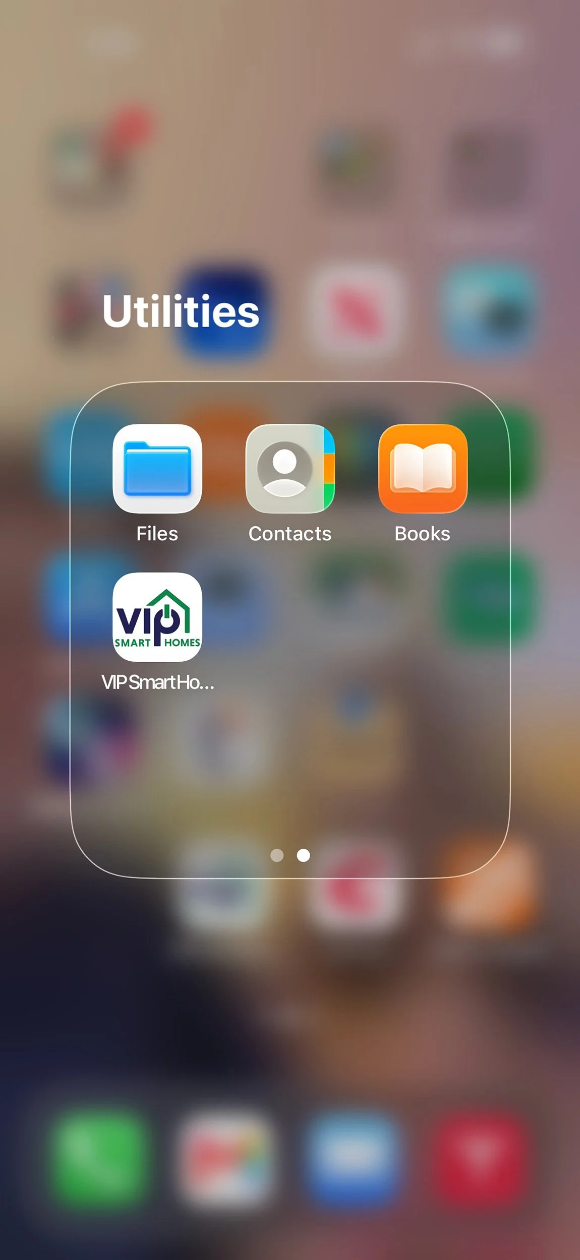 VIP Smart Homes app icon saved on an iPhone home screen inside a utility folder