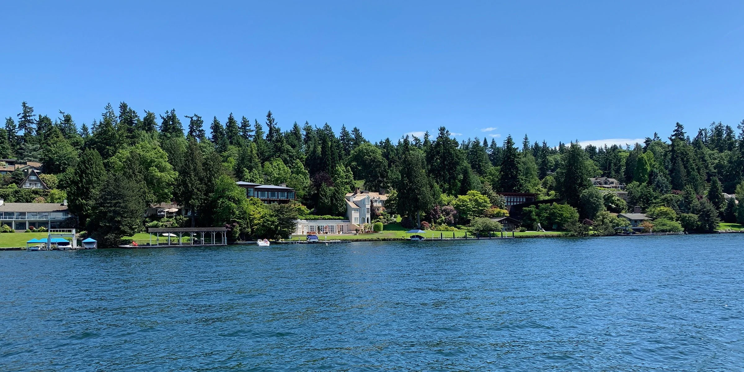 Luxury Mercer Island waterfront home with Lutron HomeWorks lighting and motorized shades by VIP Smart Homes authorized Lutron dealer East West Mercer Way