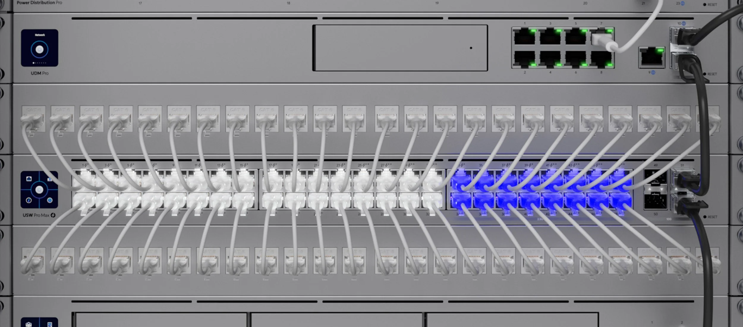 Close-up of UniFi Etherlighting Patch Cables in Professional Network Rack for Luxury Residence | VIP Smart Homes
