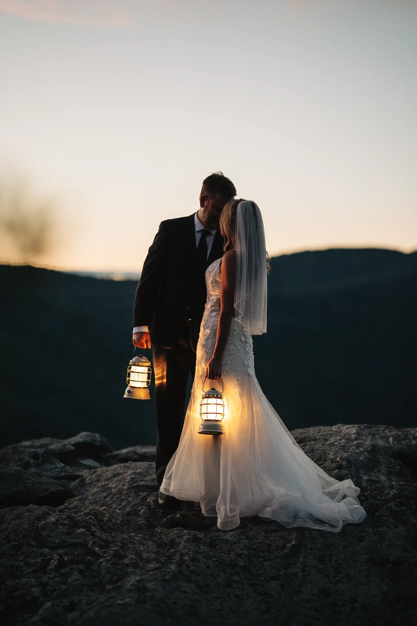 Dawn and Shane walking together during a quiet mountain elopement session