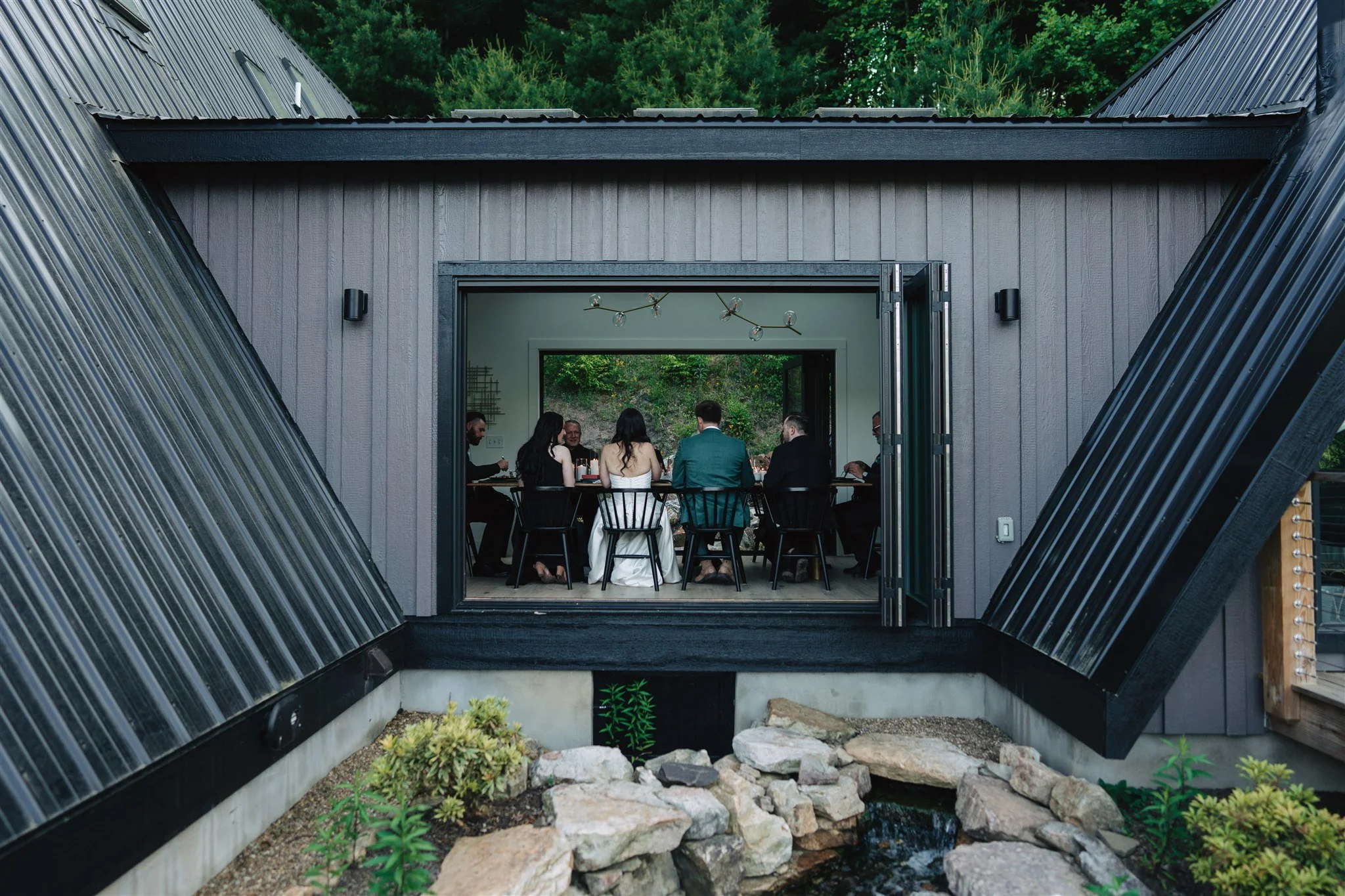Couple spending part of their wedding celebration at a mountain A-frame rental in Western North Carolina
