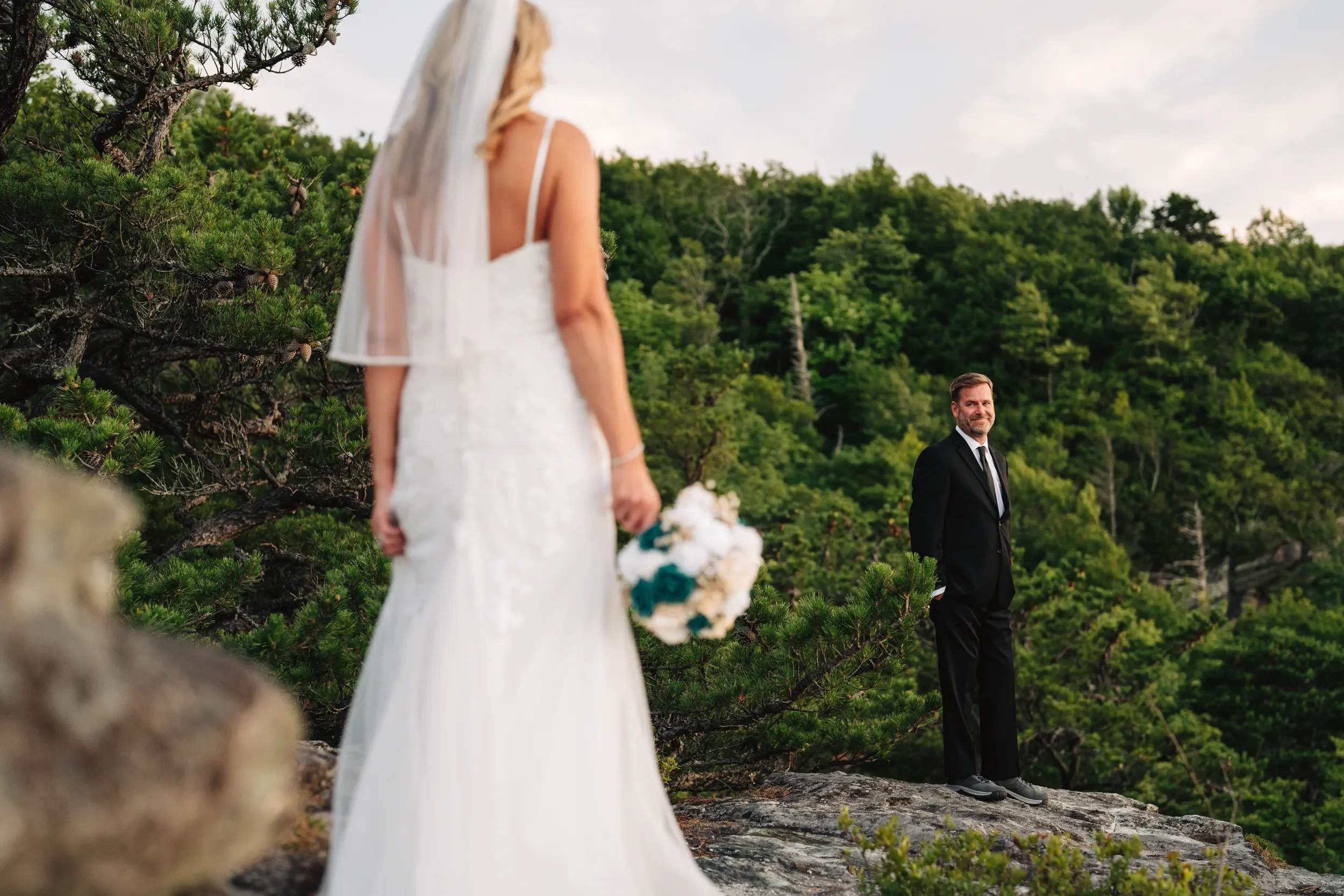 Dawn and Shane standing close together during their mountain elopement in Western North Carolina