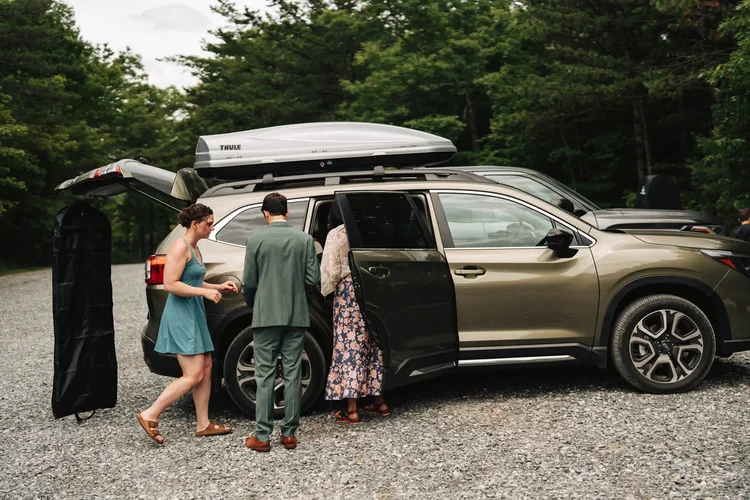 Mackenzie about to get into her wedding dress in the parking area before her Wiseman's View ceremony.