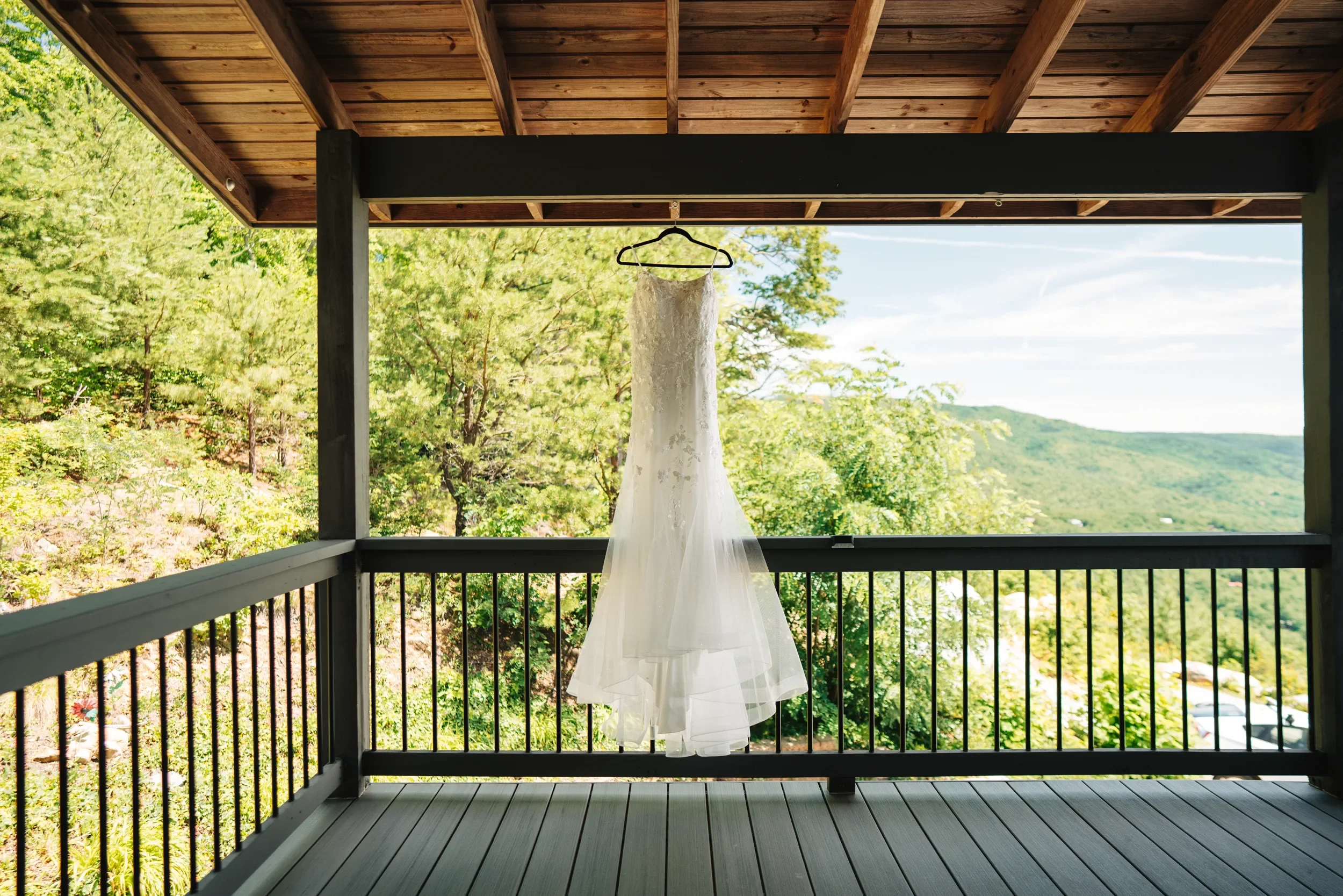 Dawn and Shane standing together at a quiet mountain overlook after their elopement near Marion North Carolina