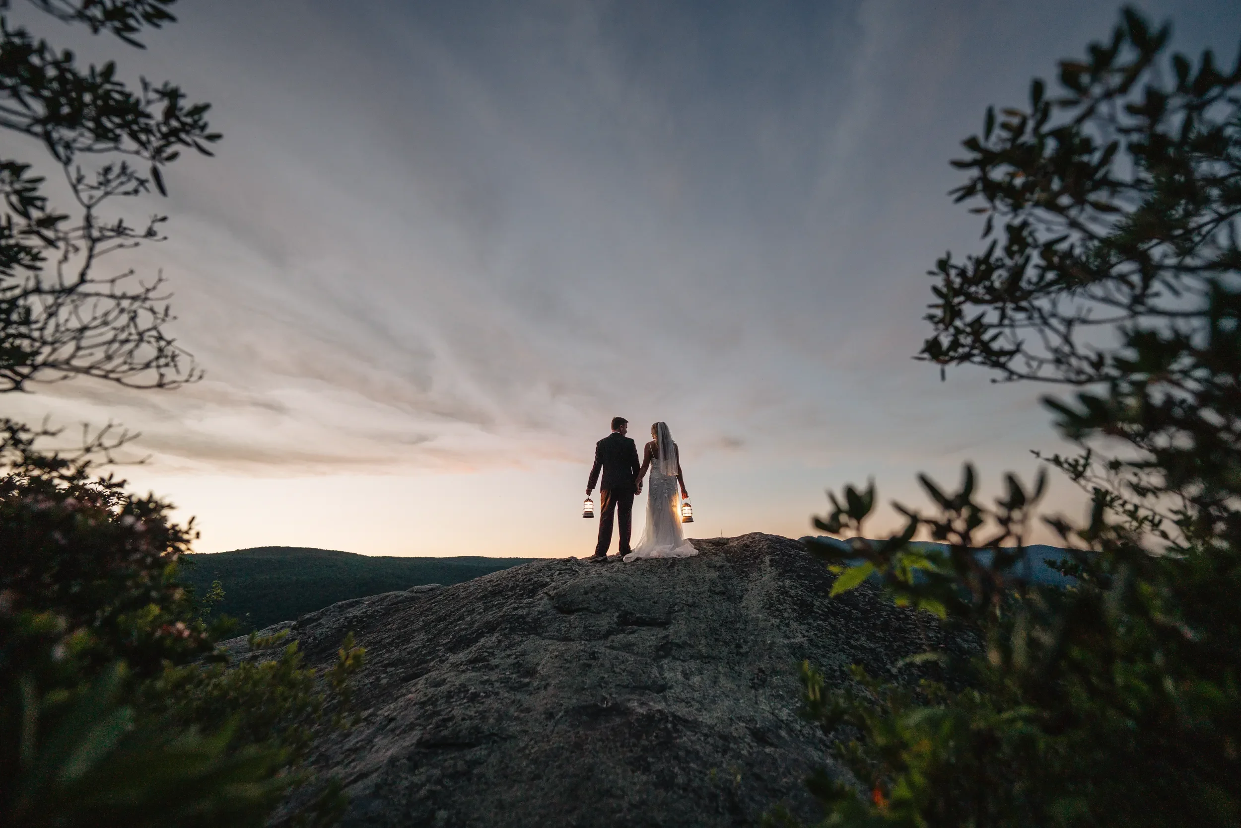 Dawn and Shane standing together at a quiet mountain overlook in Western North Carolina