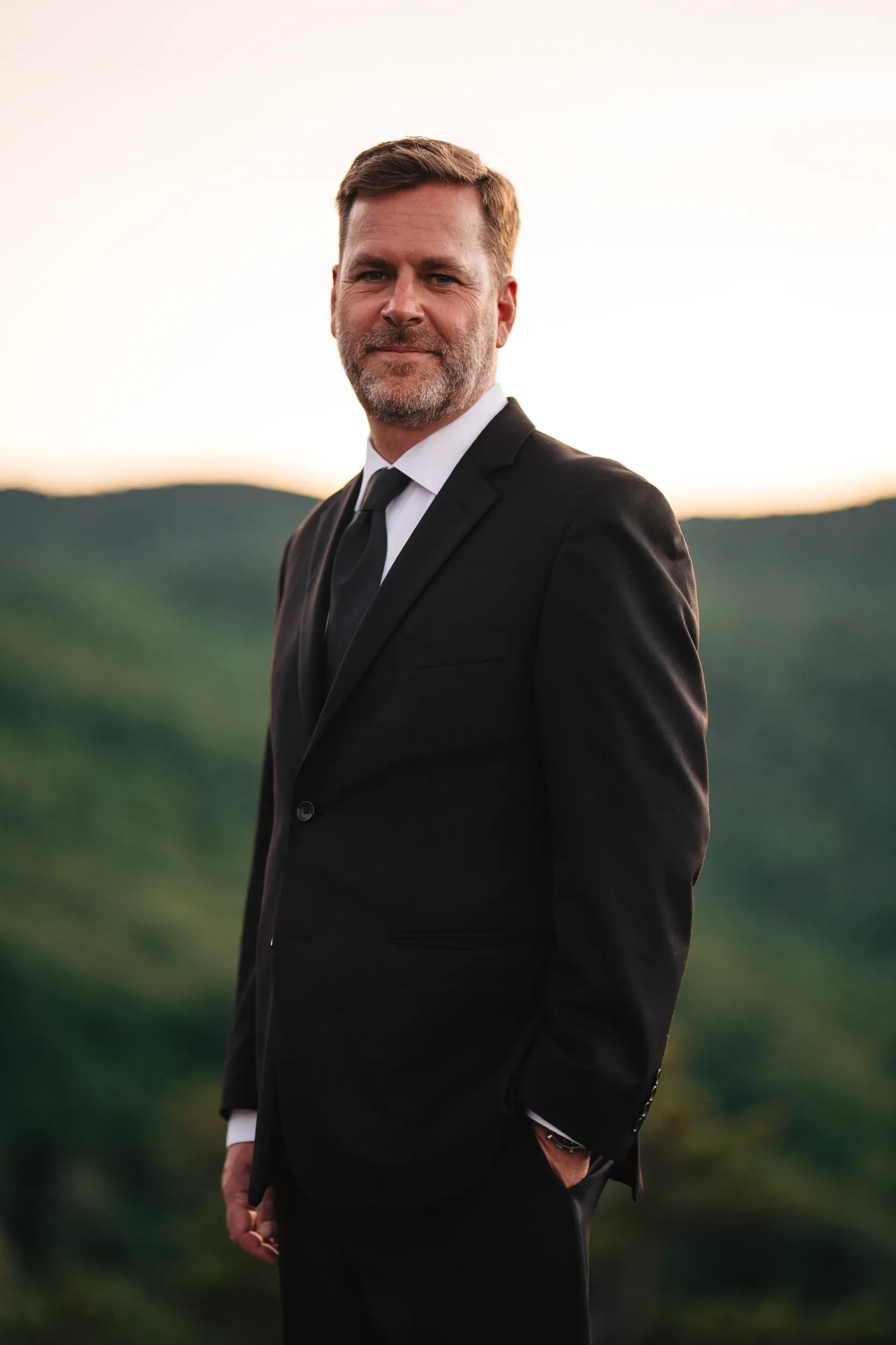 Dawn and Shane holding each other during their elopement portraits in the Blue Ridge Mountains