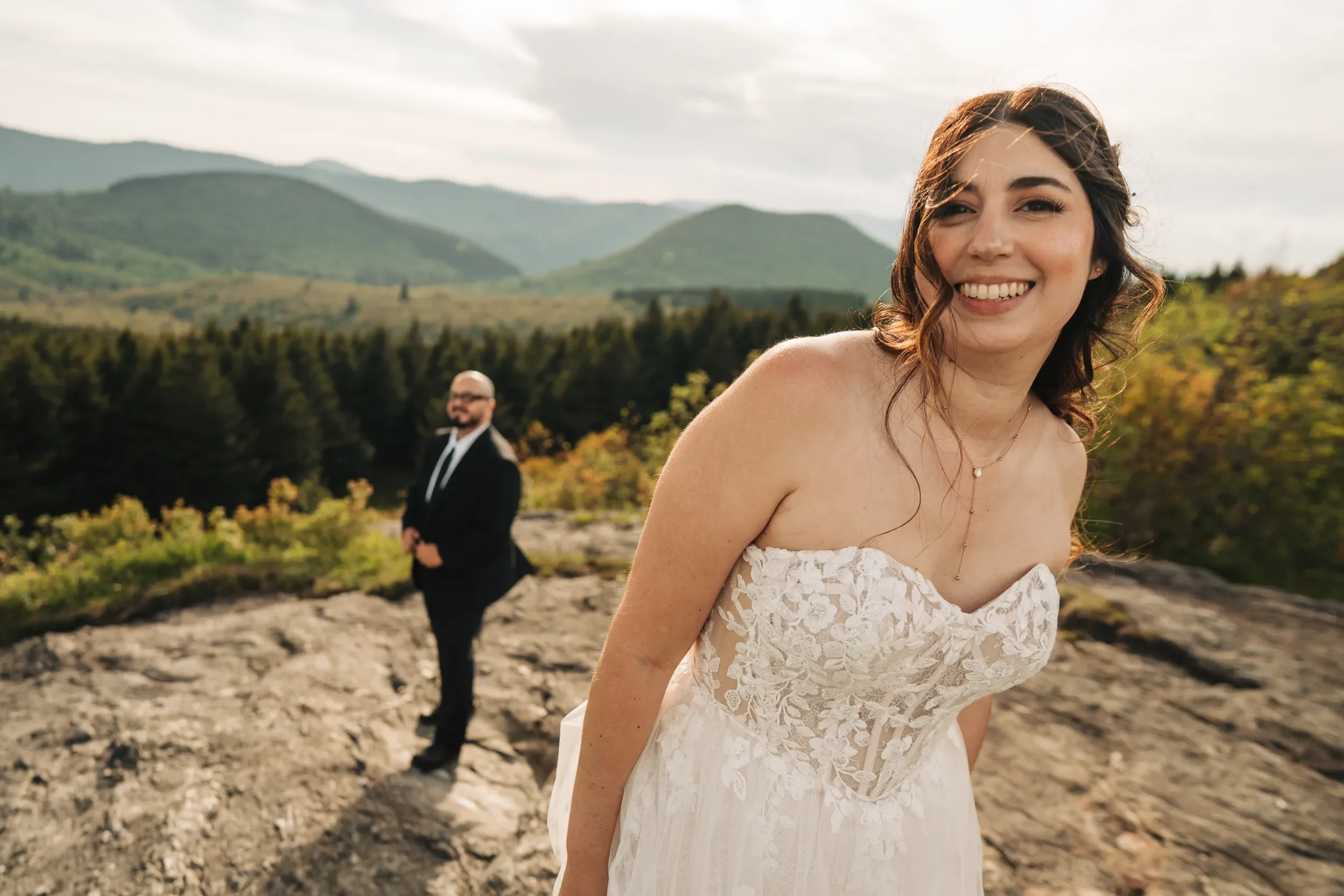 Melissa smiling during her mountain wedding day
