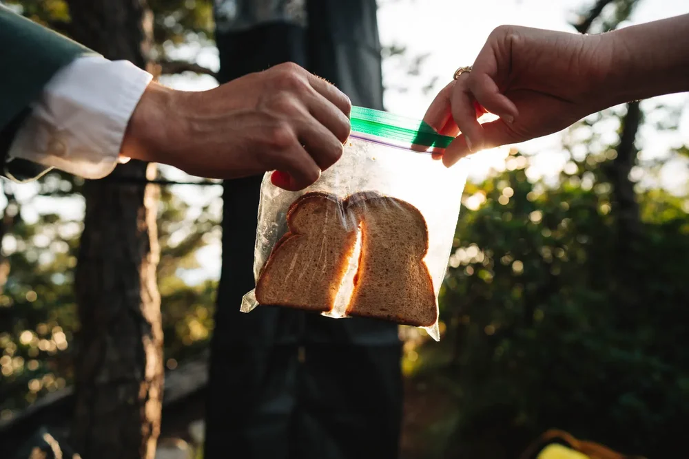 Peanut butter sandwiches and Goldfish crackers shared during a mountain wedding hike.