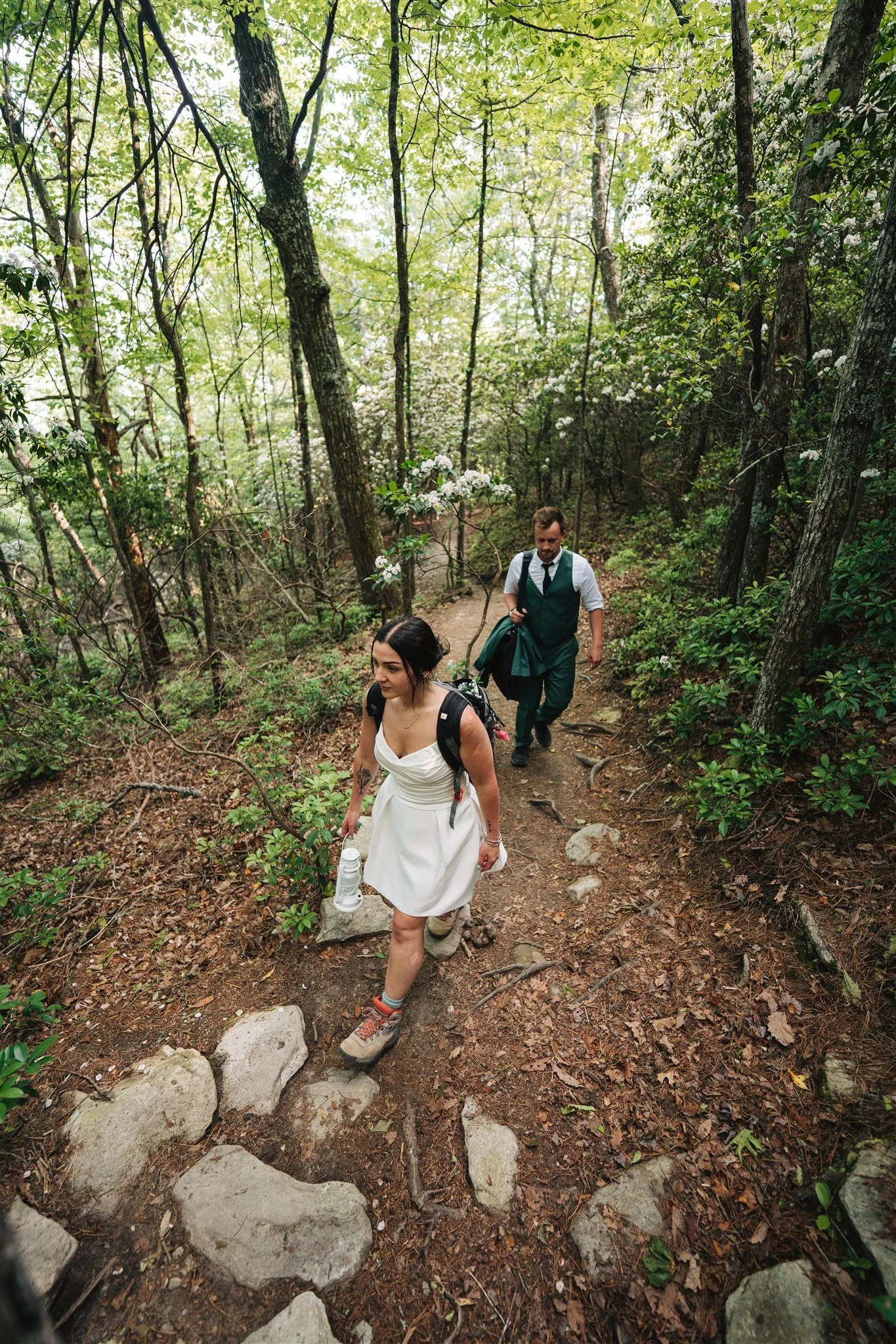 Couple hiking outdoors during a mountain elopement in North Carolina