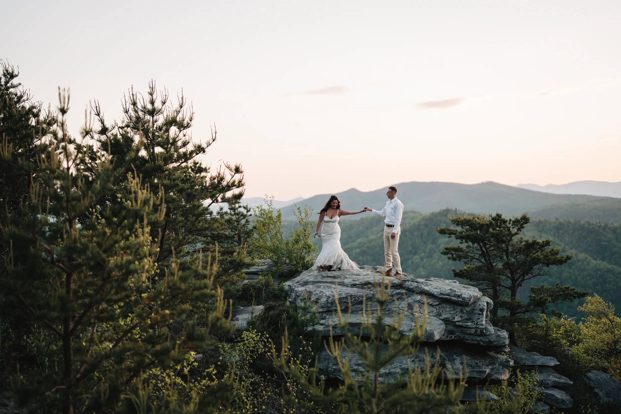 Couple walking together during an Asheville mountain elopement