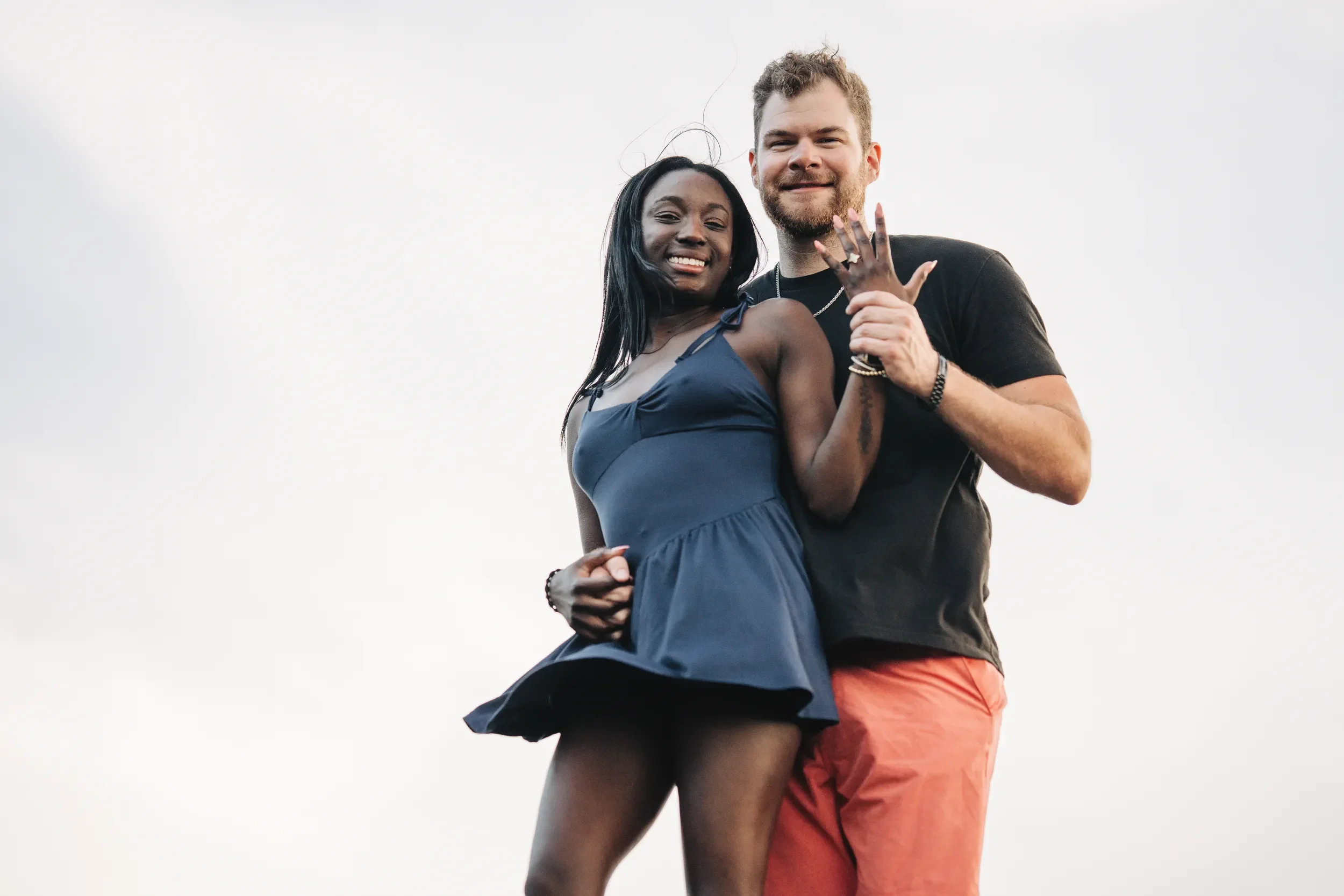 Couple celebrating after a surprise proposal in the Blue Ridge Mountains