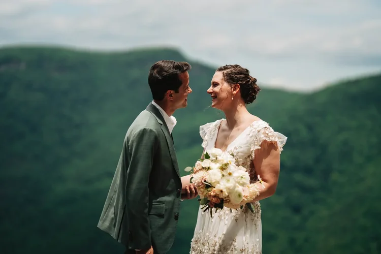 Mackenzie and Michael holding each other just after their first look at Wiseman's View.