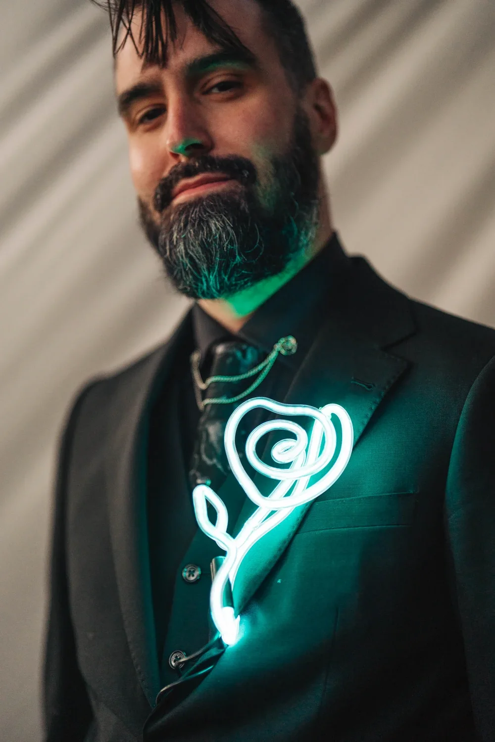 Handmade neon rose glowing during Bryanna and RJ's mountain adventure session