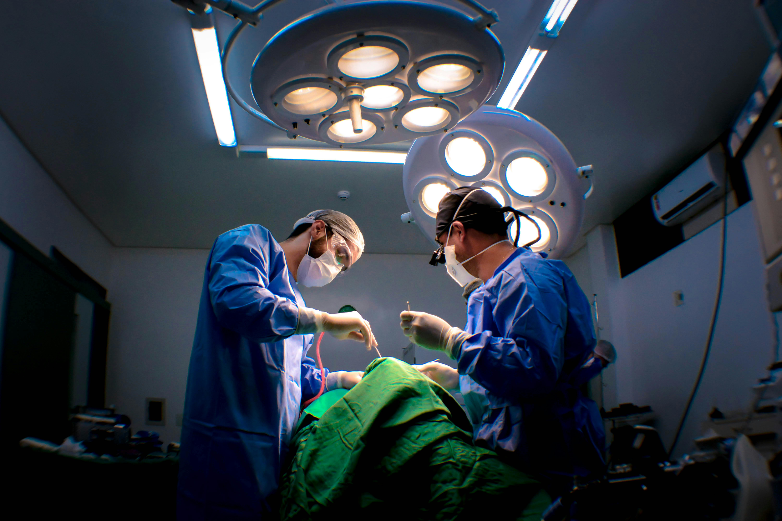 Reconstructive surgeon operating in a surgical setting