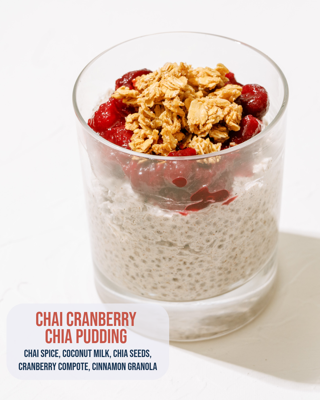 Chai Cranberry Chia Pudding: Chia pudding with coconut milk and chai spice, topped with cranberry compote and cinnamon granola.