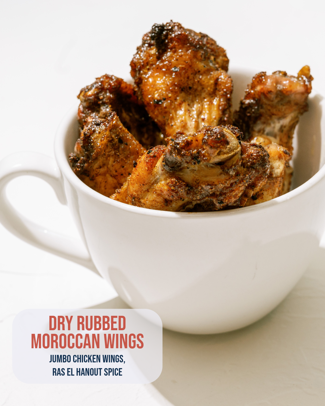 Dry Rubbed Moroccan Wings: Jumbo chicken wings seasoned with ras el hanout, an aromatic Moroccan spice blend.