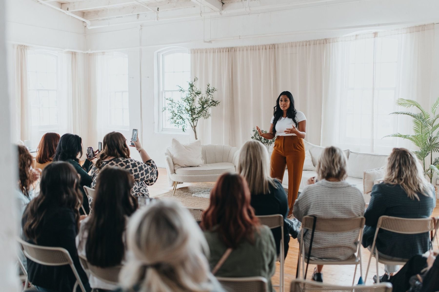 Mariangelica presenting at an intimate event