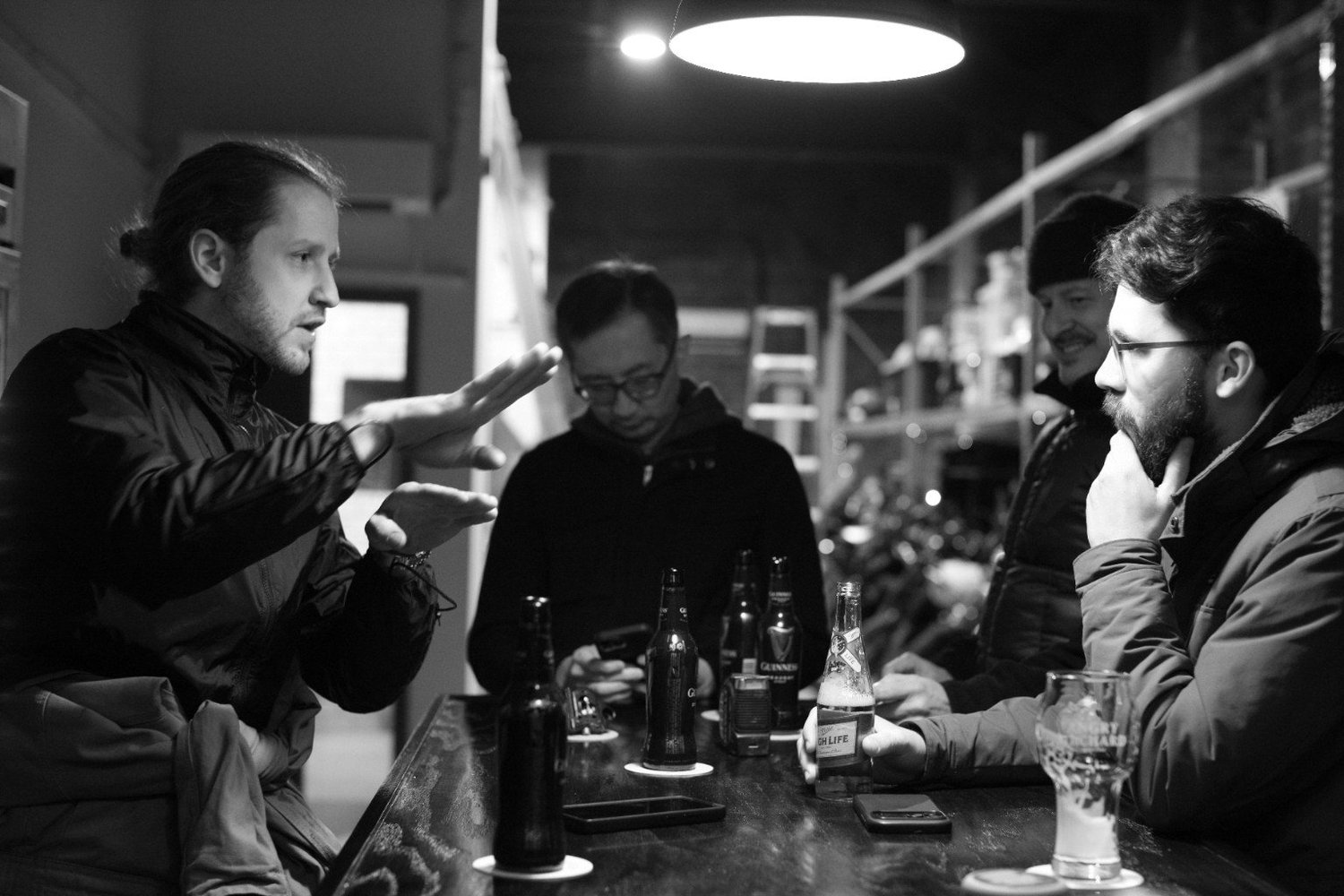 The bar and warm lighting at Displaced Motoco