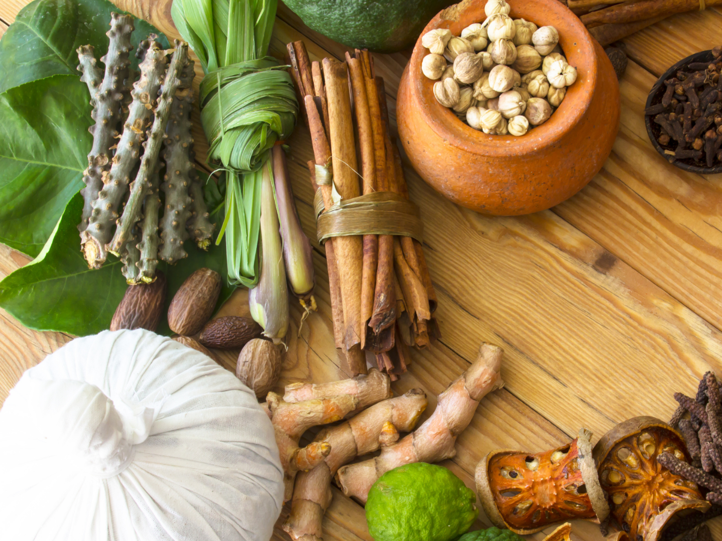 Ayurvedic herbs, oils, and natural ingredients representing holistic healing and balance