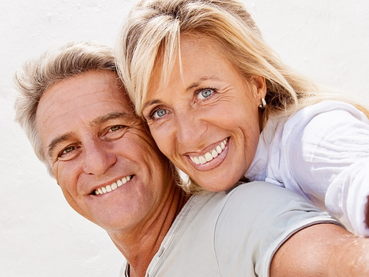 Happy couple representing intimate wellness support with Alma Duo shockwave therapy