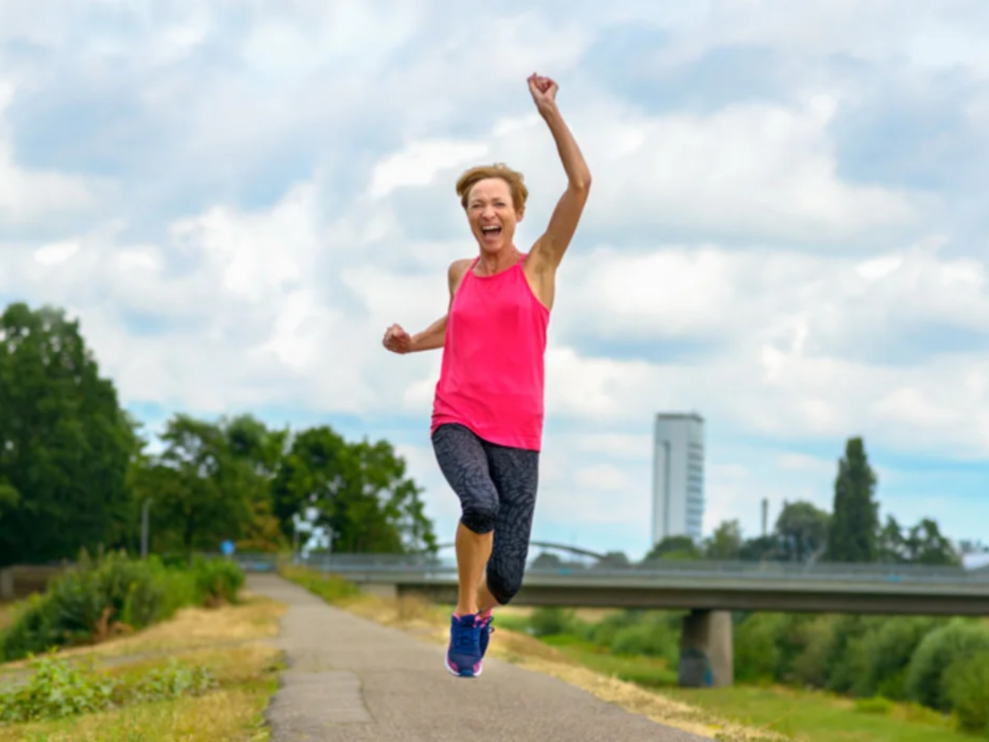 Active woman exercising outdoors representing lifestyle changes for cardiometabolic health and weight management
