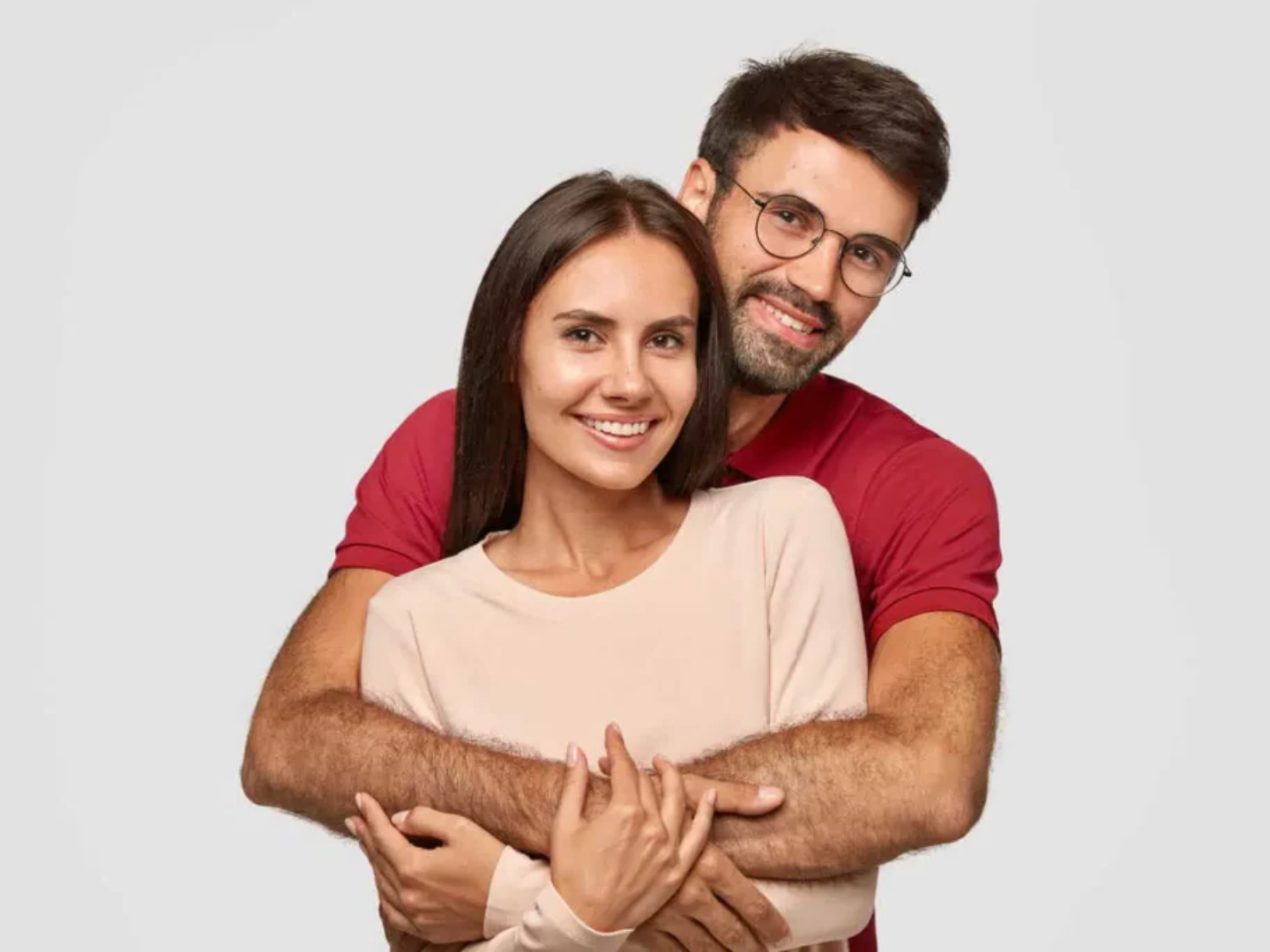 Healthy couple embracing after hormone optimization and BHRT treatment