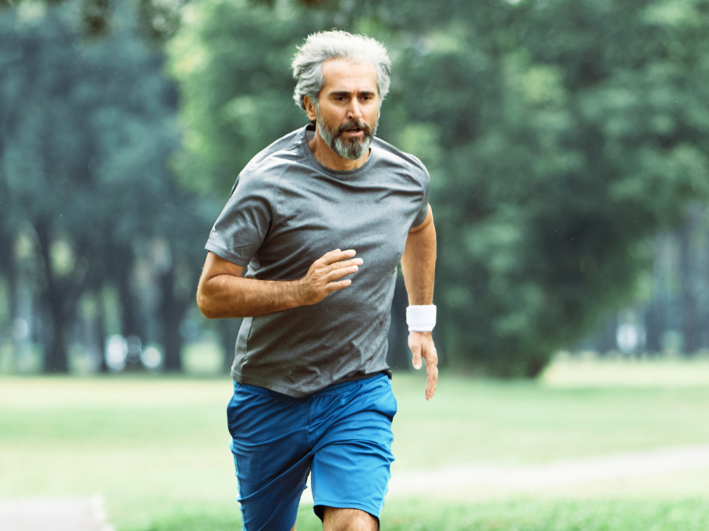 Man running for cardiovascular fitness and improved metabolic health through regular exercise