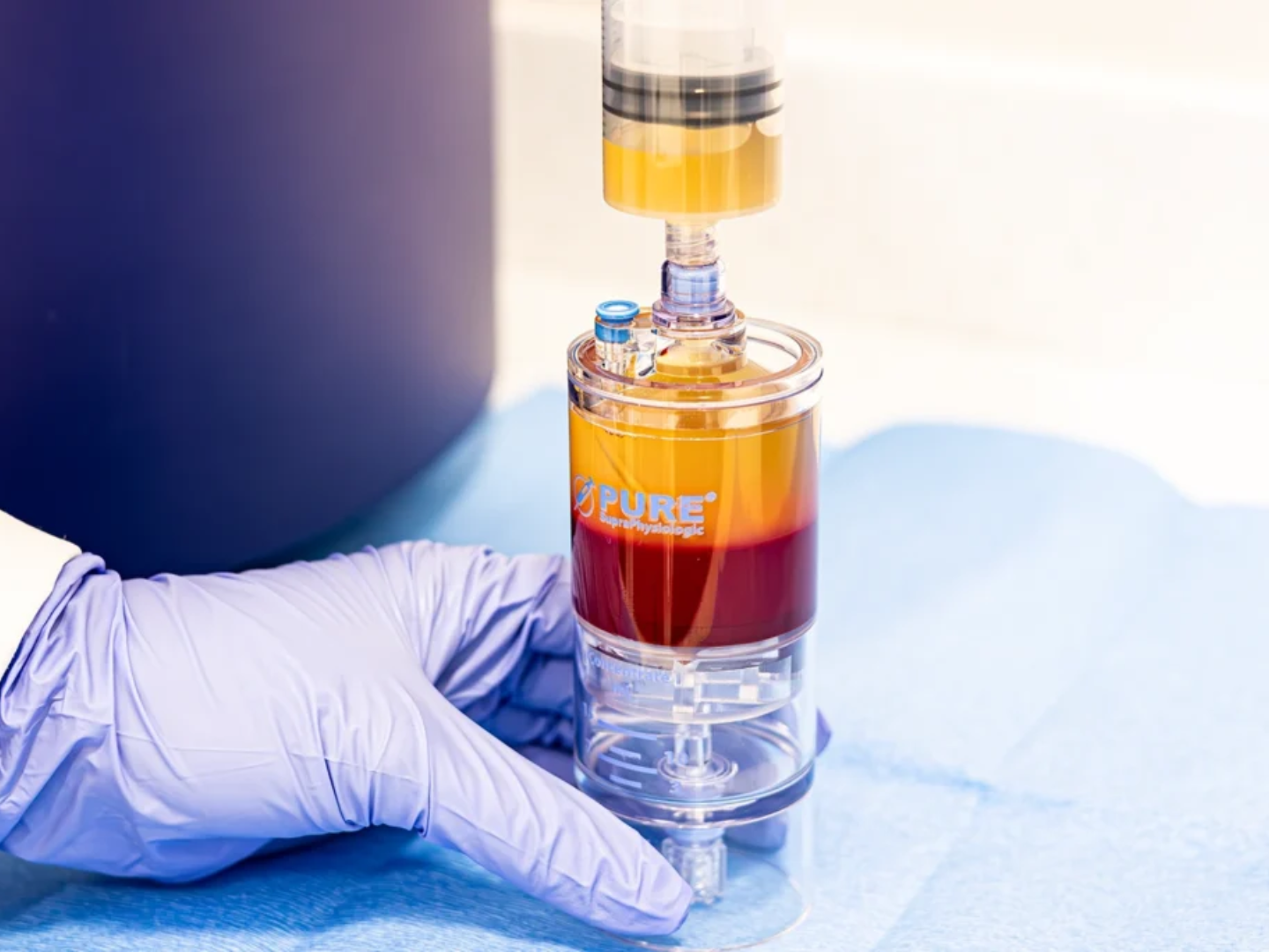 Centrifuge processing blood to isolate platelet-rich plasma (PRP) for regenerative injection therapy