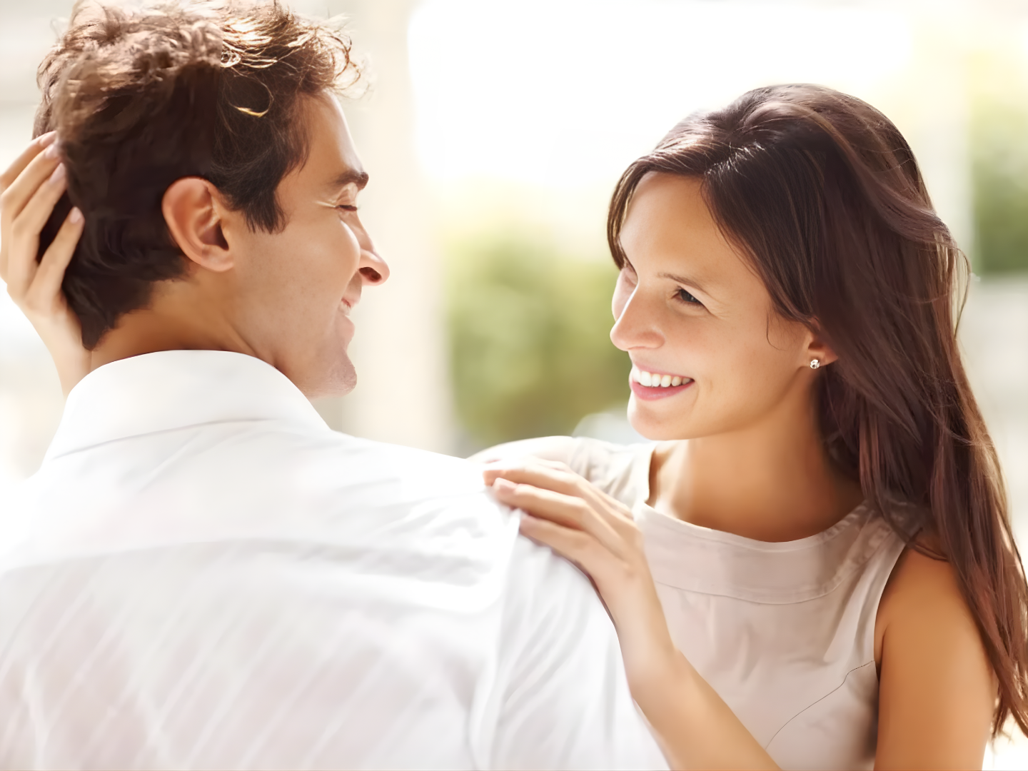 Smiling couple representing renewed confidence after Alma TED hair restoration treatment