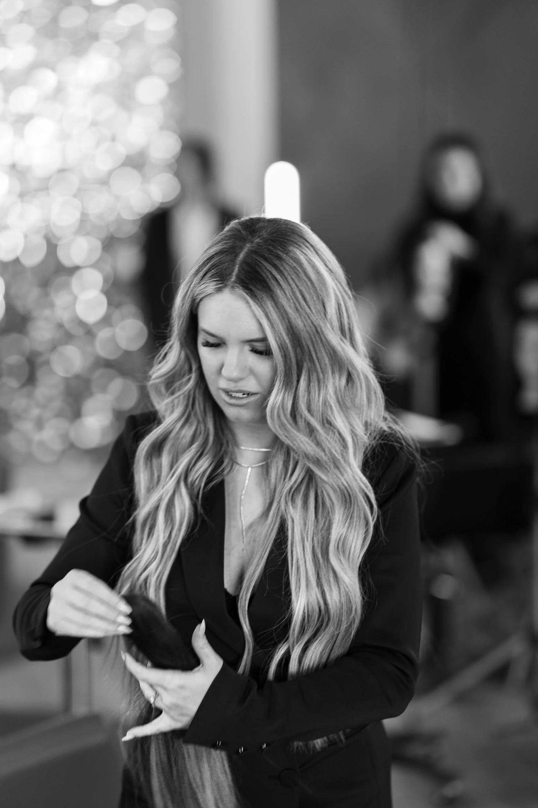 Black-and-white editorial portrait of Carissa Maness