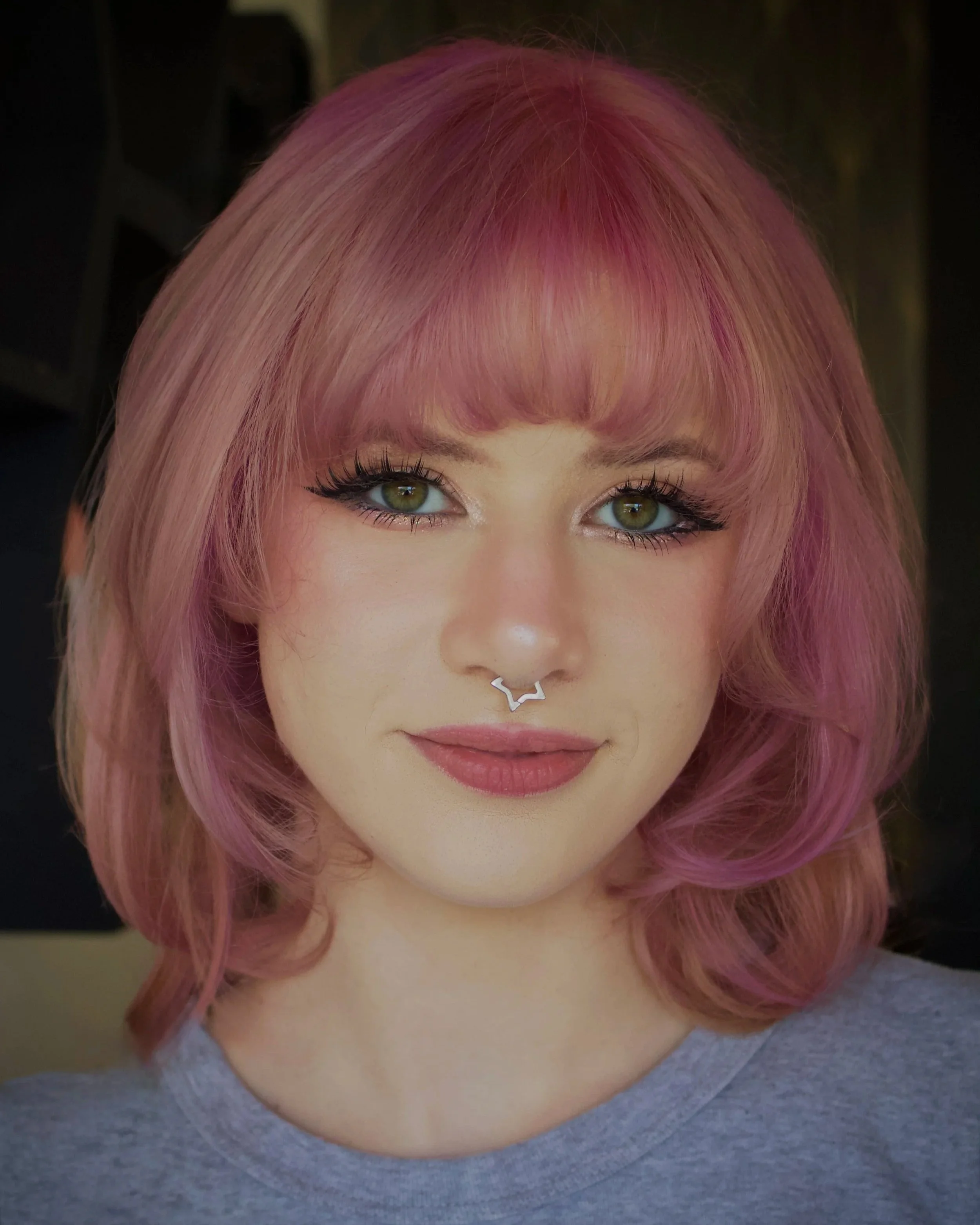 Creative pink hair color transformation at TEAL Hair & Makeup Studio