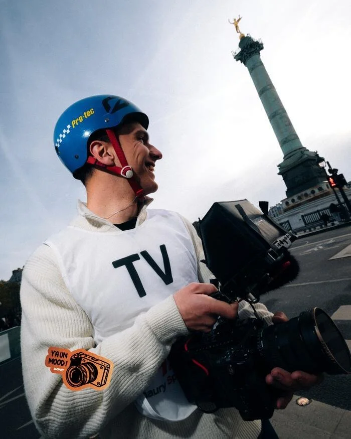 Cadreur de LUSANT Prod. sur le parcours du Marathon de Paris