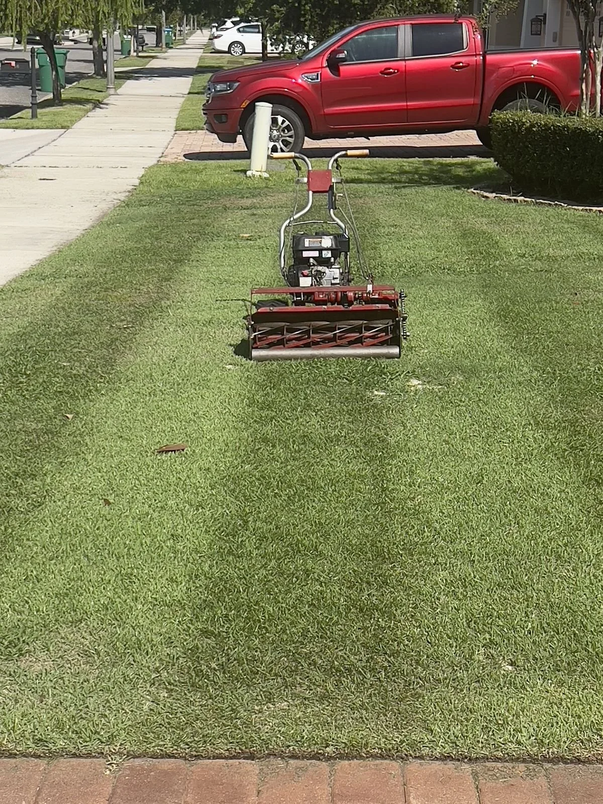 Tight Zoysia fairway stripes after Winter Park top dressing program by Michael Geist's Yard Works