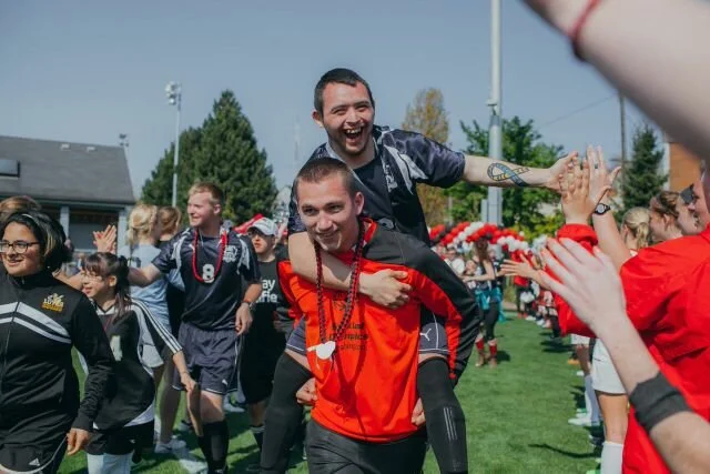 Special Olympics athletes celebrating together