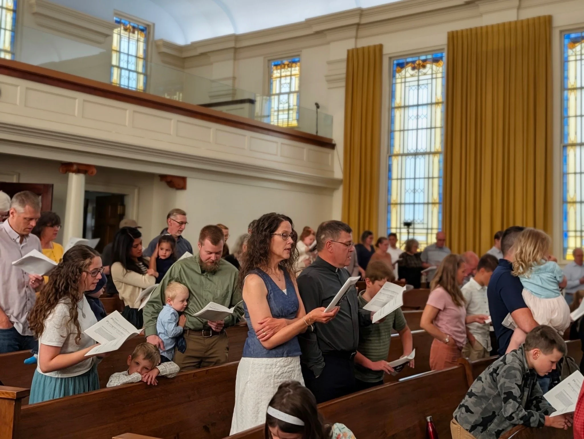 Families worshiping together at Saint Andrew’s