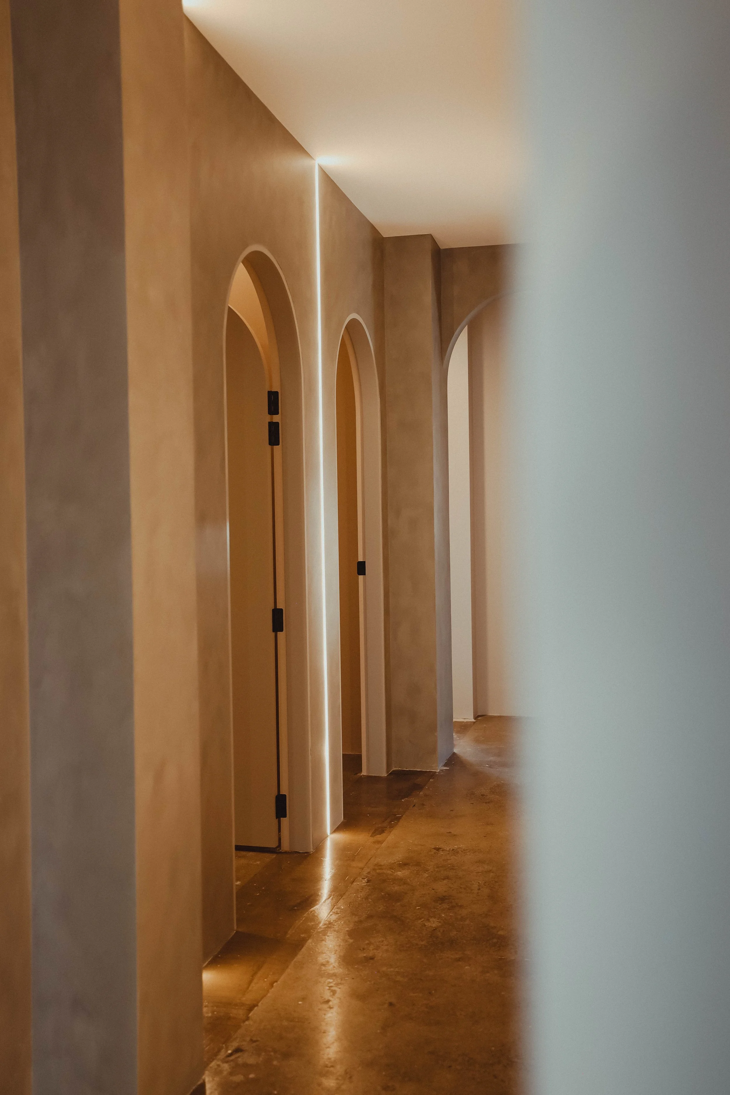 WYLD Howick acupuncture clinic — grey feature wall