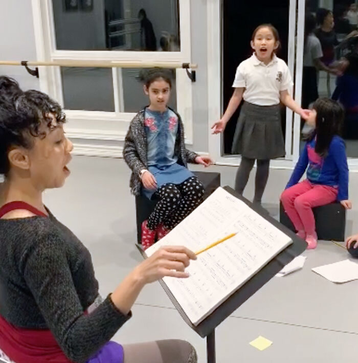 kids in musical theatre class with teacher