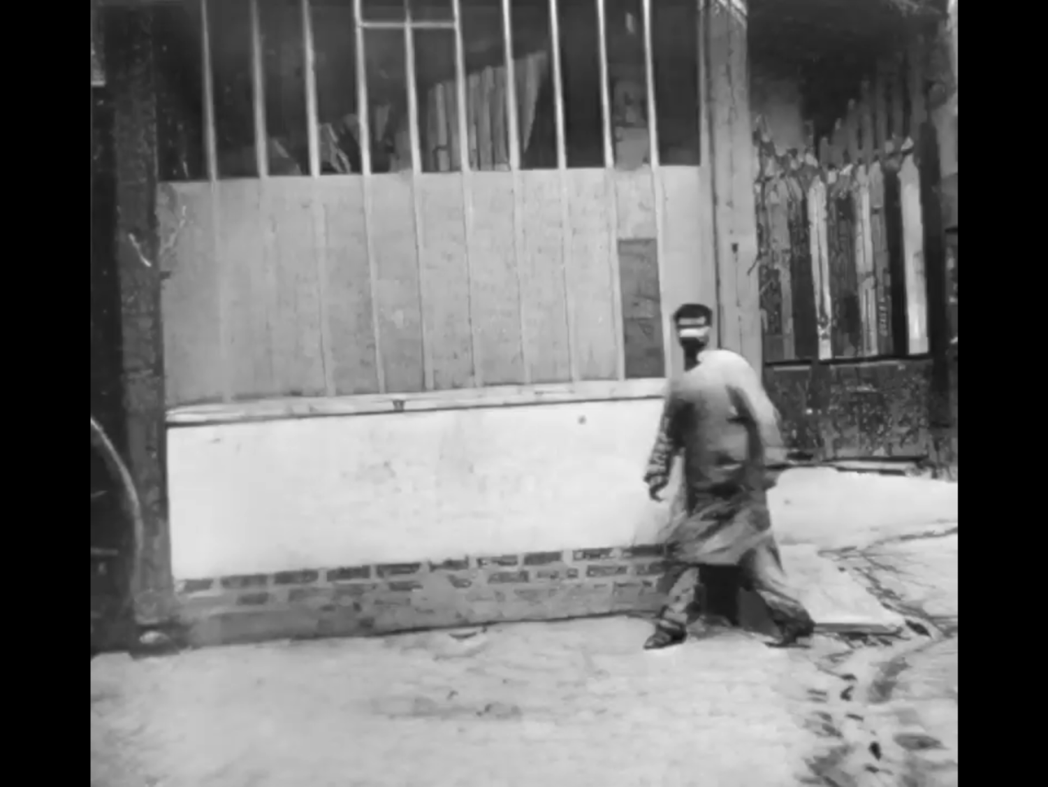 Man Walking Around the Corner (1887).png