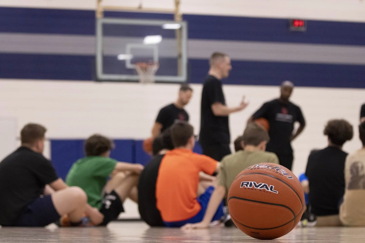 A Legacy North coaching session with young athletes gathered together