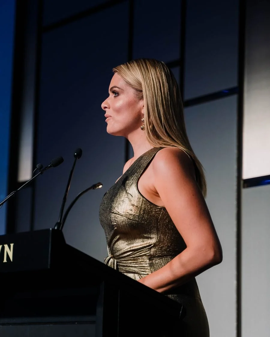 Erin Molan hosting an awards night at a Crown lectern