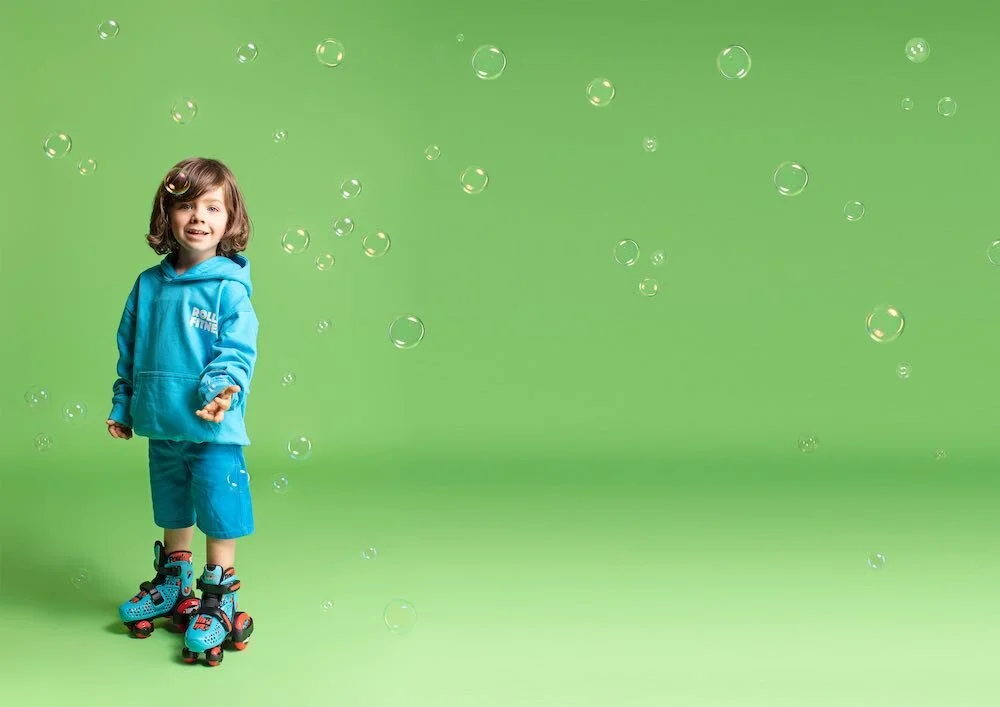 Toddler in roller skates during a RollerTots session
