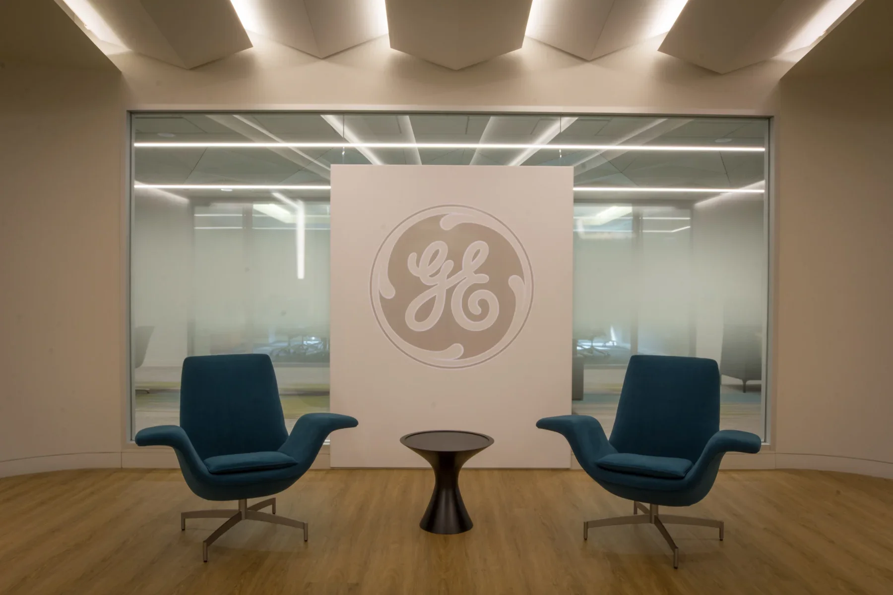 Branded glass: Privacy and brand identity in one space.