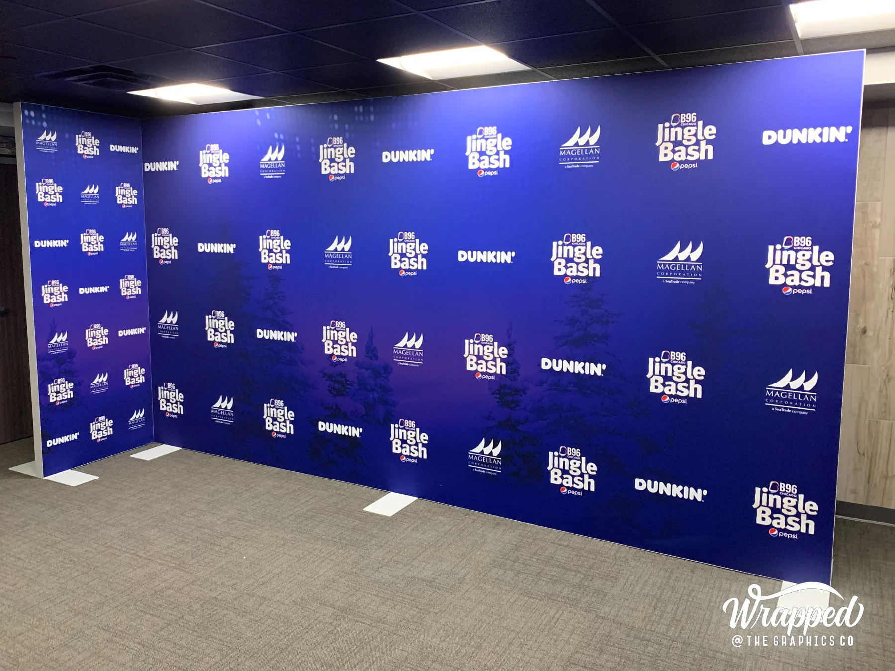 Event backdrop: A branded setting for event photography.