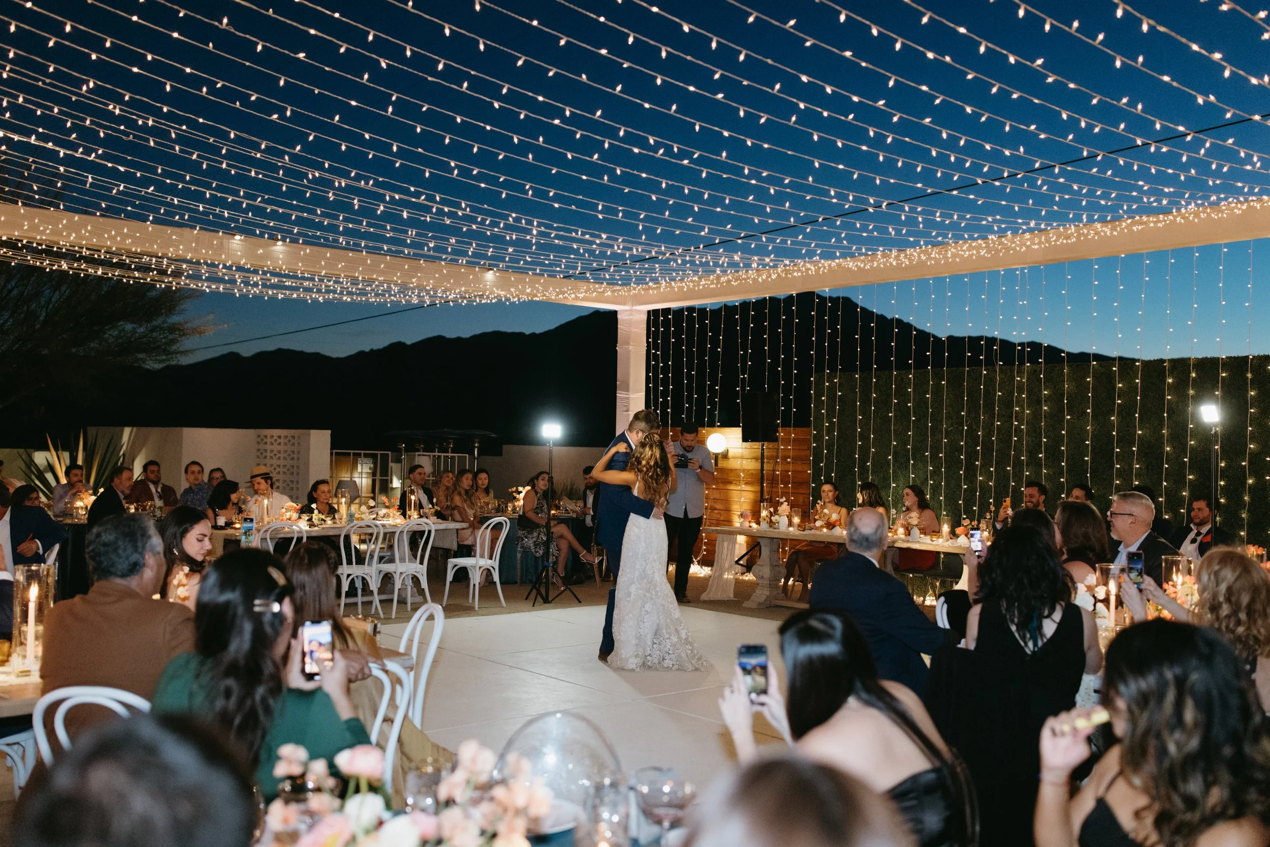 Elegant twinkle light installation at wedding reception