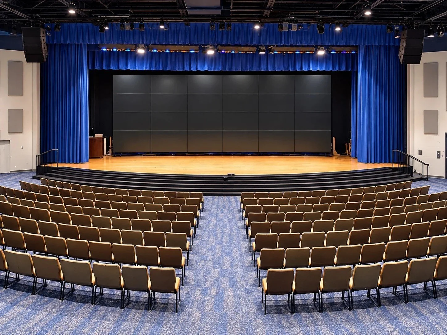 Blue Falcon Technologies video wall installation in a school auditorium